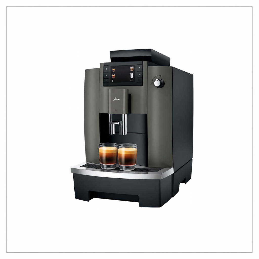 Angled view: “JURA W4 Dark Inox coffee machine, angled front view with two espresso glasses on the drip tray.”


