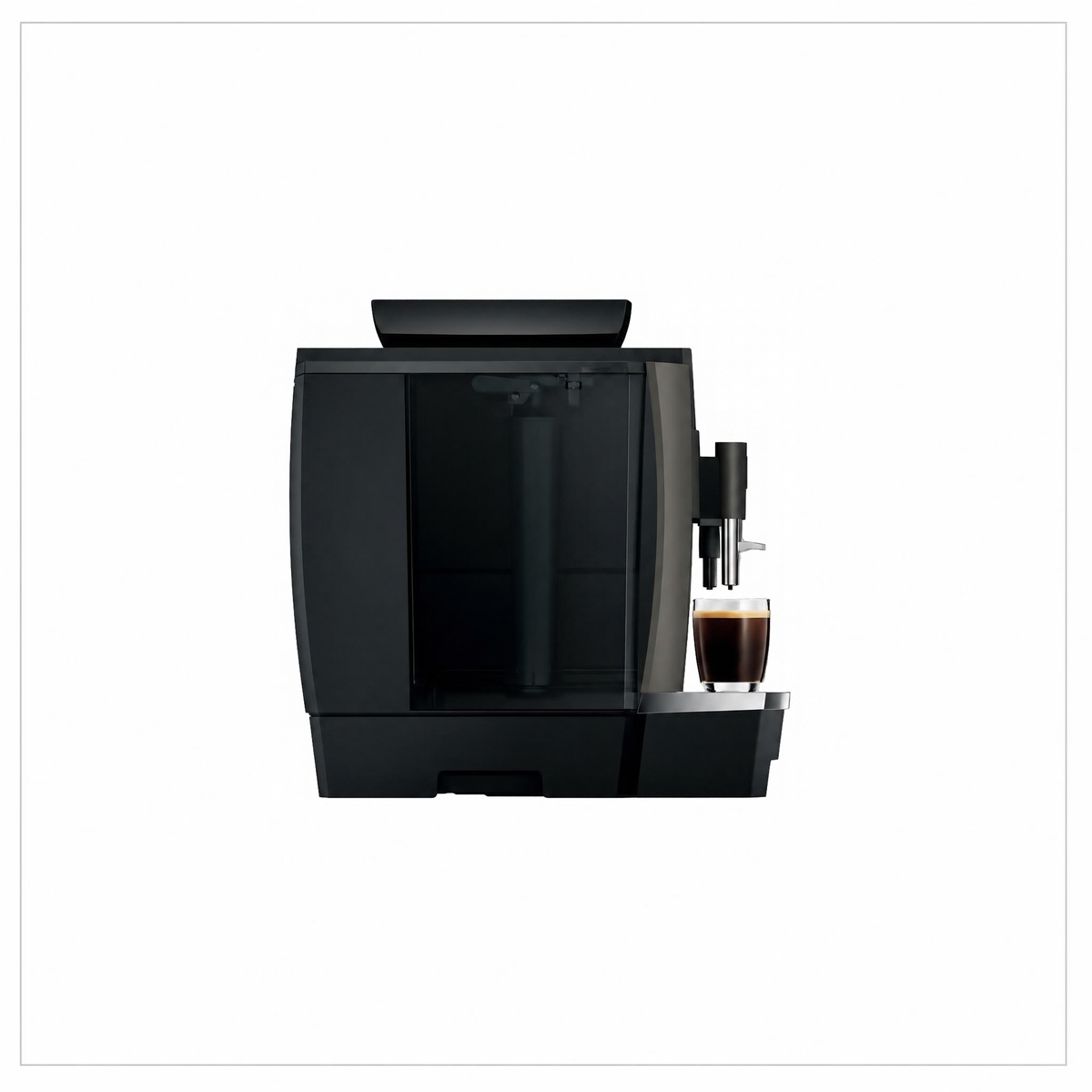 Side view: “JURA W4 Dark Inox coffee machine, side view with a glass of black coffee beneath the spout.”

