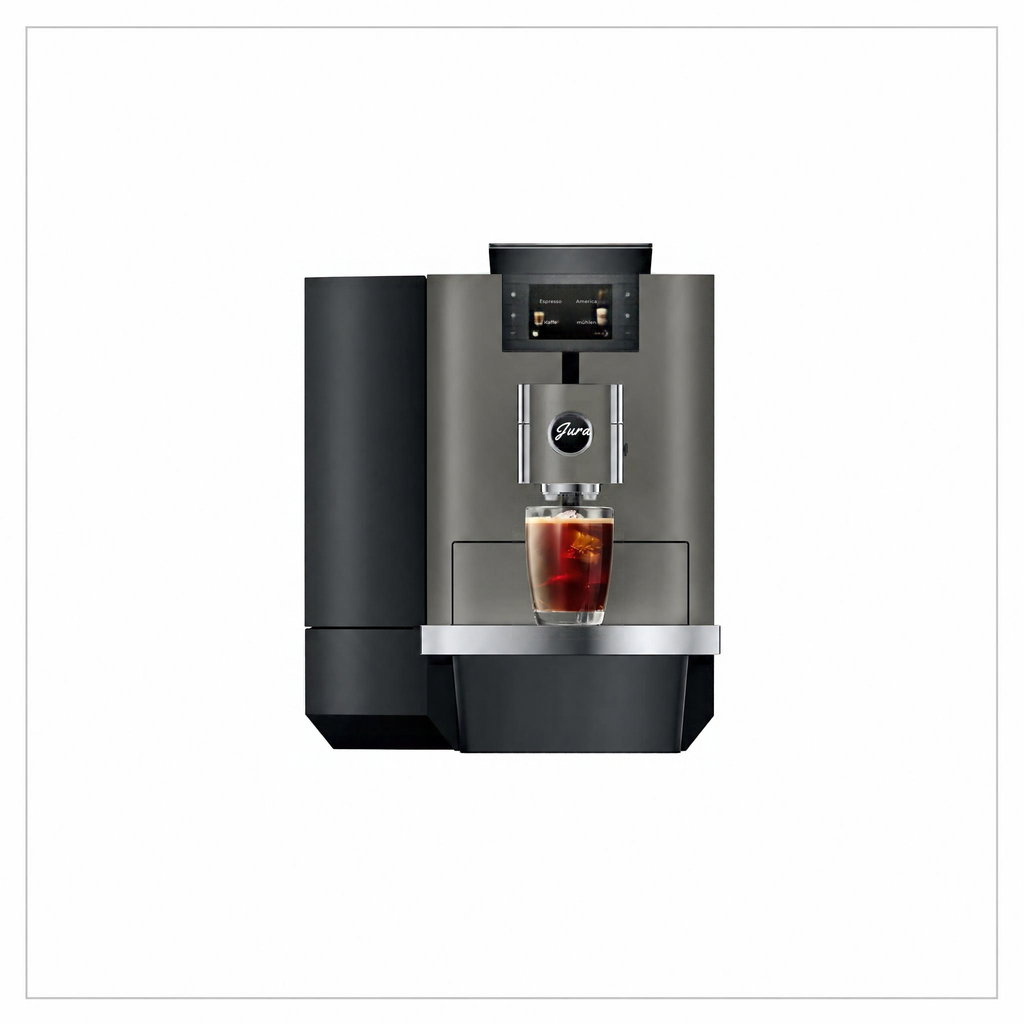 A modern  automatic coffee machine in dark gray and black, shown with a glass of iced coffee on its drip tray against a white background.