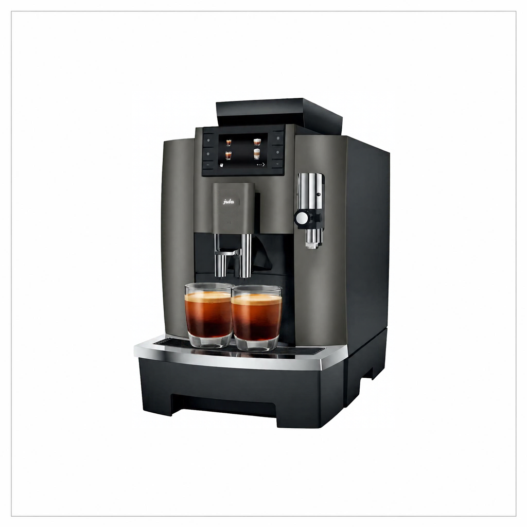 A dark gray and black espresso machine with two glasses of espresso on its drip tray, set against a plain white background.